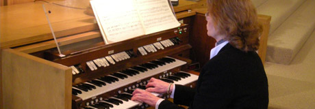 image of musician playing organ